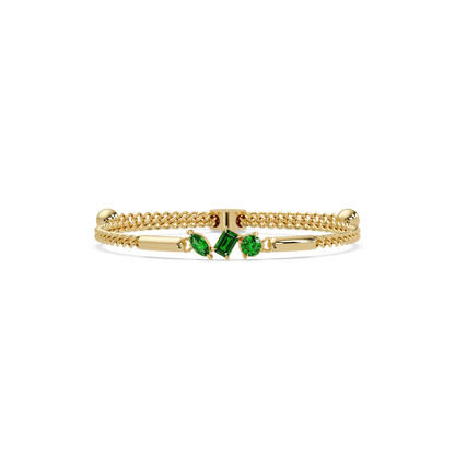 Three-stone mixed-cut colorstone hinged bangle in yellow gold with green stones