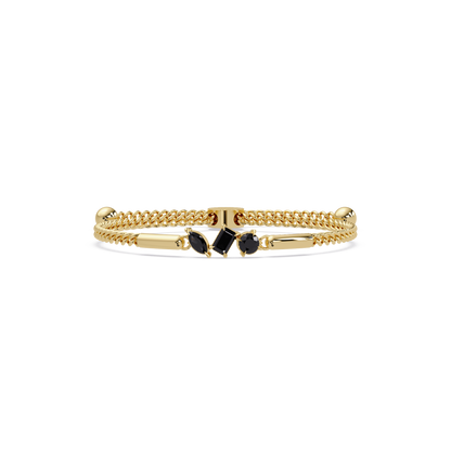 Three-stone mixed-cut colorstone hinged bangle in yellow gold with onyx stones