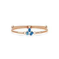 Three-stone pear and oval colorstone hinged bangle in rose gold with aquamarine stones