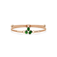 Three-stone pear and oval colorstone hinged bangle in rose gold with green stones