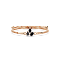 Three-stone pear and oval colorstone hinged bangle in rose gold with onyx stones