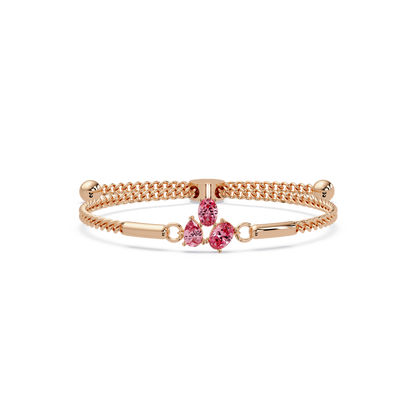 Three-stone pear and oval colorstone hinged bangle in rose gold with pink stones