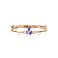 Three-stone pear and oval colorstone hinged bangle in rose gold with purple stones