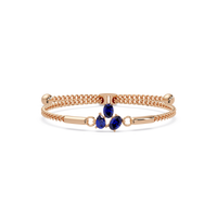 Three-stone pear and oval colorstone hinged bangle in rose gold with sapphire stones