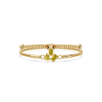 Three-stone pear and oval colorstone hinged bangle in yellow gold with yellow stones