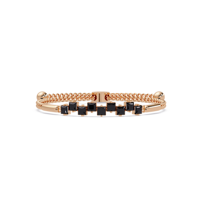 Nine princess-cut onyx colorstones in a rose gold chain-accent cuff bracelet