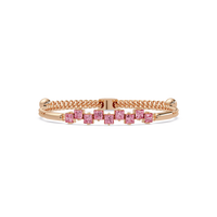 Nine princess-cut pink colorstones in a rose gold chain-accent cuff bracelet