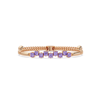 Nine princess-cut purple colorstones in a rose gold chain-accent cuff bracelet