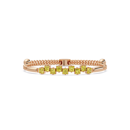 Nine princess-cut yellow colorstones in a rose gold chain-accent cuff bracelet