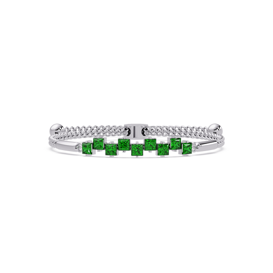 Nine princess-cut green colorstones in a white gold chain-accent cuff bracelet