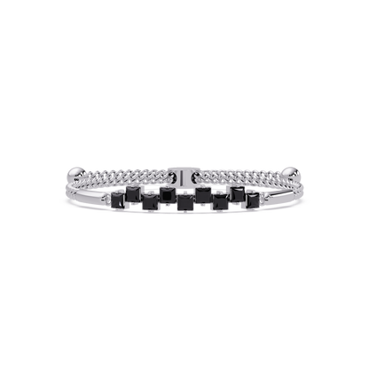 Nine princess-cut onyx colorstones in a white gold chain-accent cuff bracelet