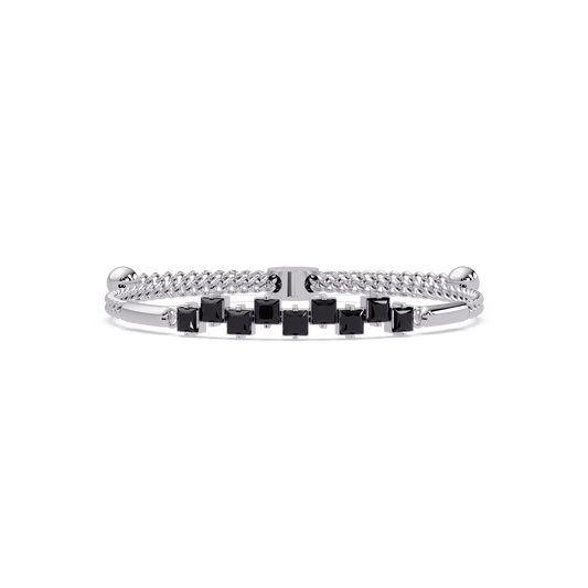 Nine princess-cut onyx colorstones in a white gold chain-accent cuff bracelet