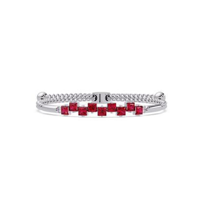 Nine princess-cut red colorstones in a white gold chain-accent cuff bracelet