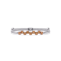 Nine princess-cut topaz colorstones in a white gold chain-accent cuff bracelet