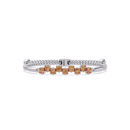 Nine princess-cut topaz colorstones in a white gold chain-accent cuff bracelet