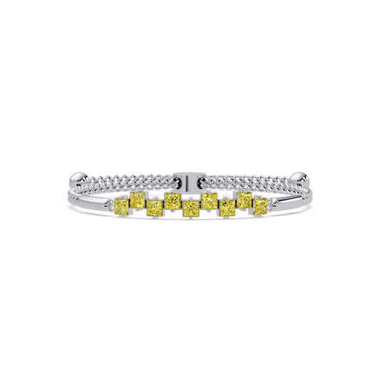 Nine princess-cut yellow colorstones in a white gold chain-accent cuff bracelet