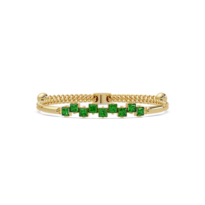 Nine princess-cut green colorstones in a yellow gold chain-accent cuff bracelet