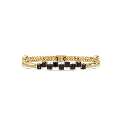 Nine princess-cut onyx colorstones in a yellow gold chain-accent cuff bracelet