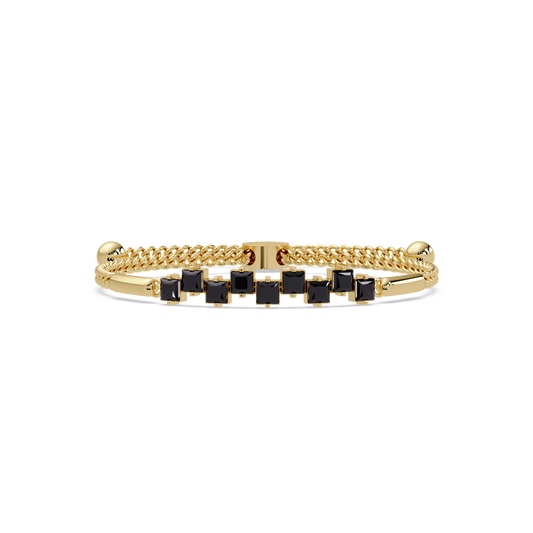 Nine princess-cut onyx colorstones in a yellow gold chain-accent cuff bracelet