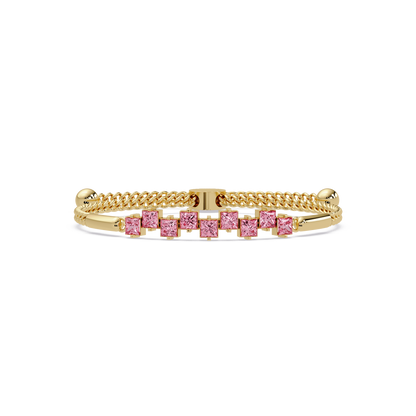 Nine princess-cut pink colorstones in a yellow gold chain-accent cuff bracelet