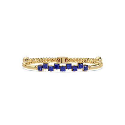Nine princess-cut sapphire colorstones in a yellow gold chain-accent cuff bracelet