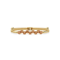 Nine princess-cut topaz colorstones in a yellow gold chain-accent cuff bracelet