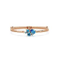 Mixed-cut five-stone colorstone open bangle with aquamarine stones in rose gold