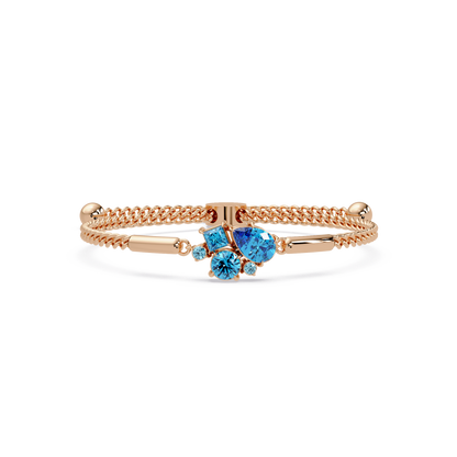 Mixed-cut five-stone colorstone open bangle with aquamarine stones in rose gold