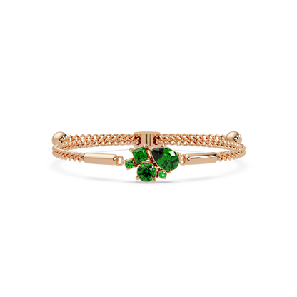 Mixed-cut five-stone colorstone open bangle with green stones in rose gold