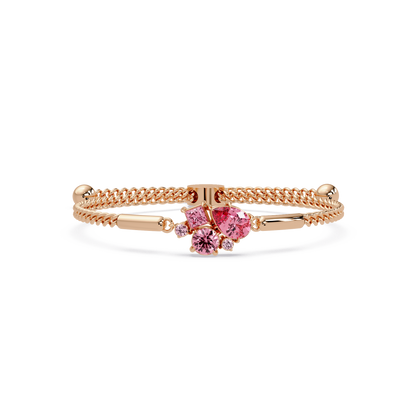 Mixed-cut five-stone colorstone open bangle with pink stones in rose gold