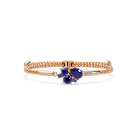 Mixed-cut five-stone colorstone open bangle with sapphire stones in rose gold