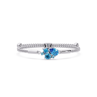 Mixed-cut five-stone colorstone open bangle with aquamarine stones in white gold