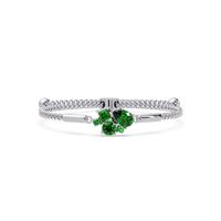 Mixed-cut five-stone colorstone open bangle with green stones in white gold