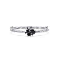 Mixed-cut five-stone colorstone open bangle with onyx stones in white gold