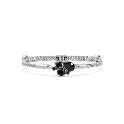 Mixed-cut five-stone colorstone open bangle with onyx stones in white gold