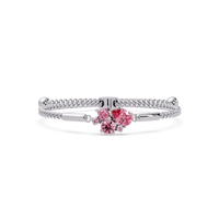 Mixed-cut five-stone colorstone open bangle with pink stones in white gold
