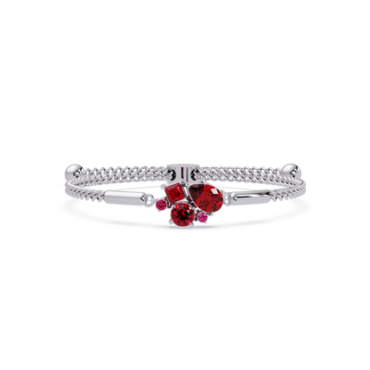 Mixed-cut five-stone colorstone open bangle with red stones in white gold
