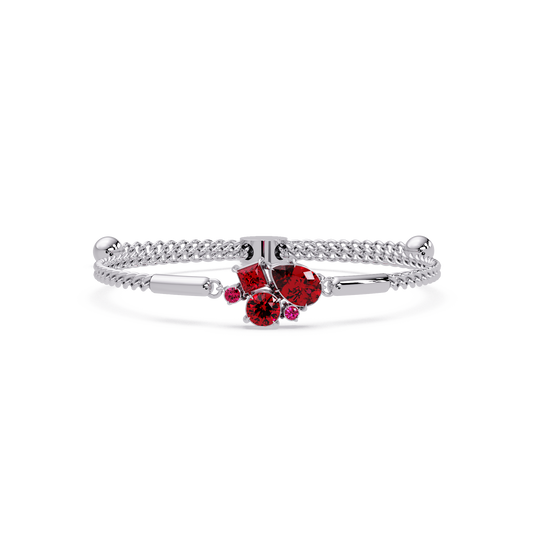 Mixed-cut five-stone colorstone open bangle with red stones in white gold