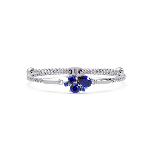 Mixed-cut five-stone colorstone open bangle with sapphire stones in white gold