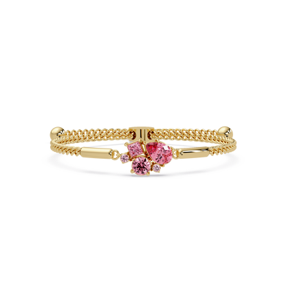 Mixed-cut five-stone colorstone open bangle with pink stones in yellow gold