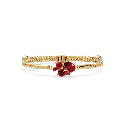 Mixed-cut five-stone colorstone open bangle with red stones in yellow gold