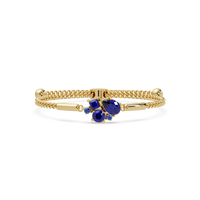 Mixed-cut five-stone colorstone open bangle with sapphire stones in yellow gold