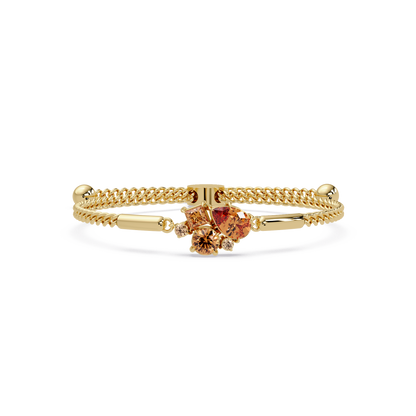 Mixed-cut five-stone colorstone open bangle with topaz stones in yellow gold