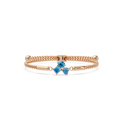 Three-stone lab-grown colorstone adjustable chain bracelet with aquamarine blue stones in rose gold