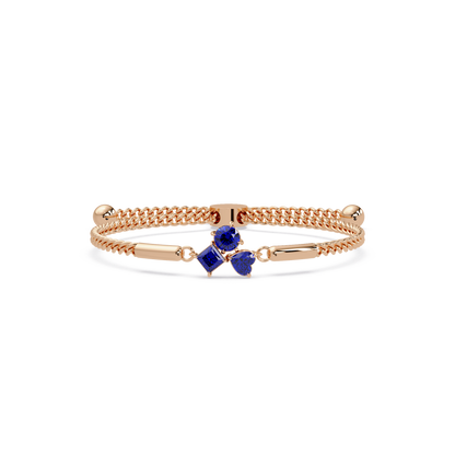 Three-stone lab-grown colorstone adjustable chain bracelet with sapphire blue stones in rose gold