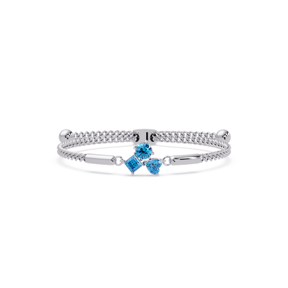 Three-stone lab-grown colorstone adjustable chain bracelet with aquamarine blue stones in white gold