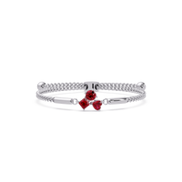 Three-stone colorstone adjustable chain bracelet with ruby red stones in white gold