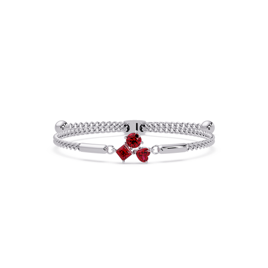 Three-stone colorstone adjustable chain bracelet with ruby red stones in white gold