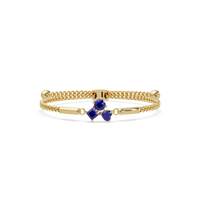 Three-stone colorstone adjustable chain bracelet with sapphire blue stones in yellow gold