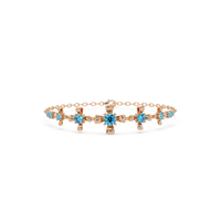 Nine-stone round colorstone chain bracelet, aquamarine blue gemstones in rose gold
